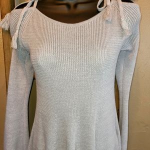 Cup cakes and cashmere sweater.